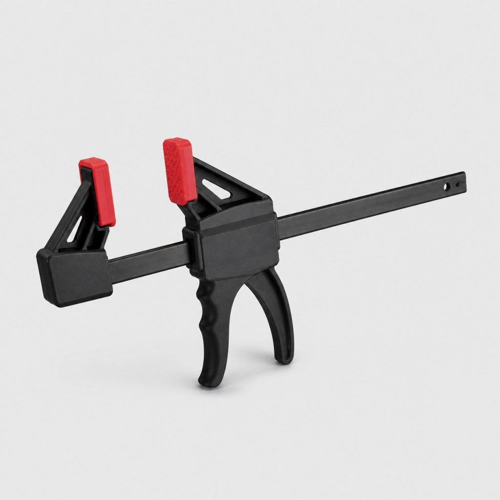 Serre-joint plastique à corps nylon noir et mors rouges